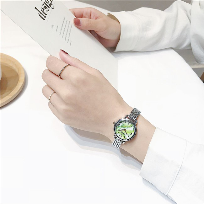 Đồng hồ nữ dây kim loại bạc mặt tròn chiếc lá xanh thời trang ĐHĐ16001
