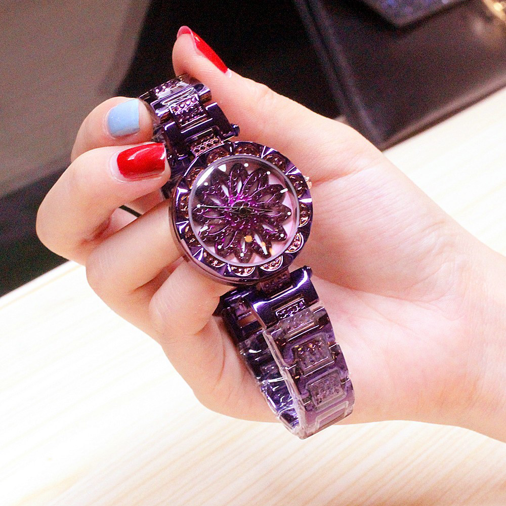 Đồng hồ nữ dây kim loại mặt tròn hoa xoay tím thời trang ĐHĐ13502
