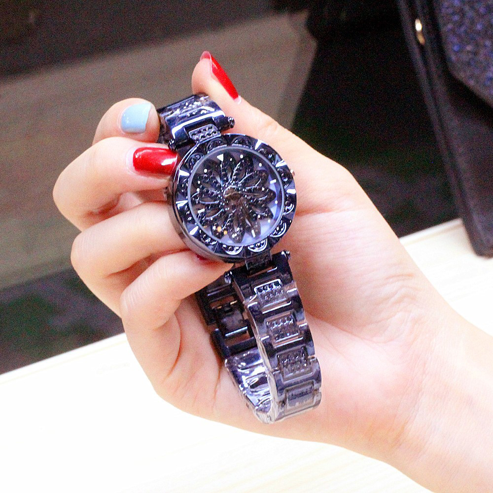 Đồng hồ nữ dây kim loại mặt tròn hoa xoay xanh dương sành điệu ĐHĐ13503