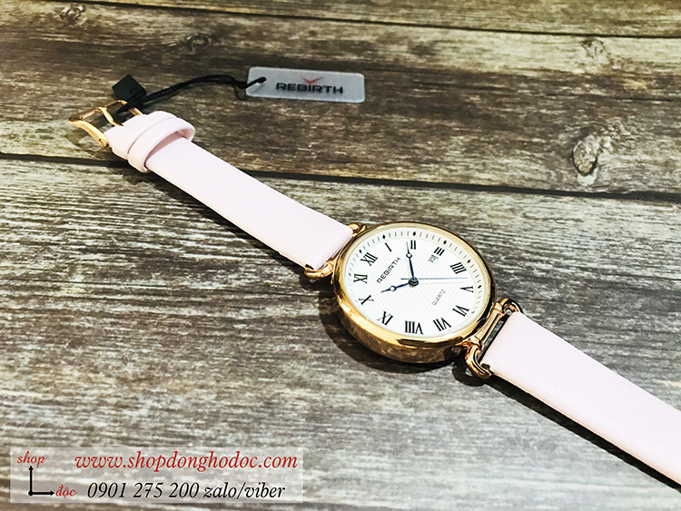 Đồng hồ nữ dây da mặt tròn có lịch hồng pastel Rebirth ĐHĐ21203